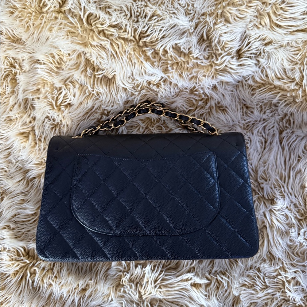 Chanel LARGE CLASSIC HANDBAG
Grained Calfskin & Gold-Tone Metal retail $11,700 - Picture 6 of 15